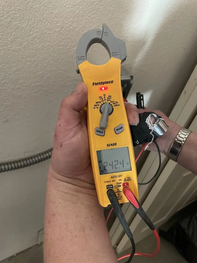 Voltage testing with clamp meter during Hot Tub / Pool Electrical Wiring in New Haven